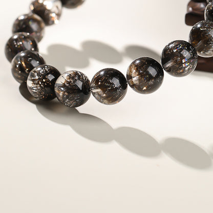 The black Super Seven bracelet designed for Scorpios enhances their insight and energy protection