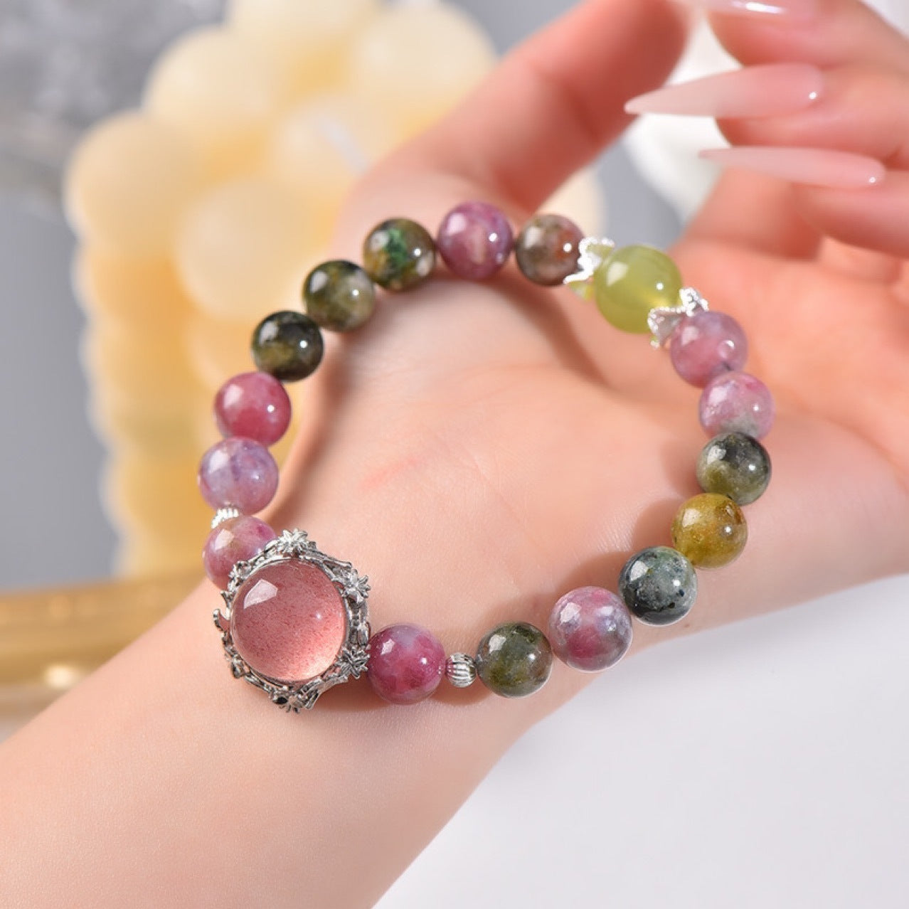 A close-up of the bright red inclusions in strawberry crystal beads, showcasing their energy characteristics that attract love and enhance sweet relationships