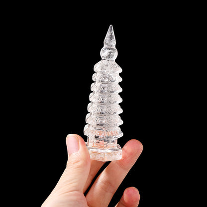 Sunlight filtered through the crystal tower, casting beautiful shadows on the desktop and creating a positive office environment.