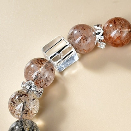 A close-up of the dense hair strands of the ultra-black hair crystal, revealing the metallic luster and powerful energy field that flickers under the light