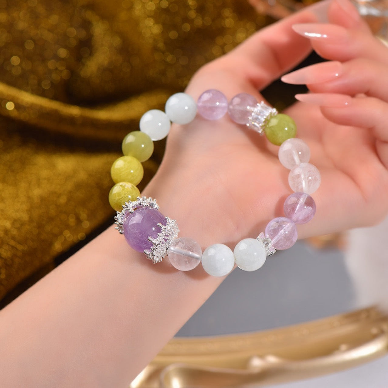 The completed bracelet in the desk scene serves as an energy tool for purifying the space and enhancing concentration