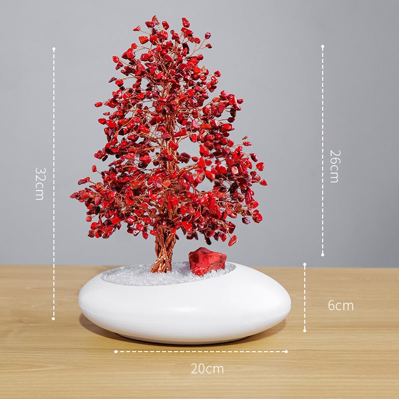 The crystal tree, when paired with the vision board and the diary, demonstrates its practical application as the law of attraction and for setting personal goals.