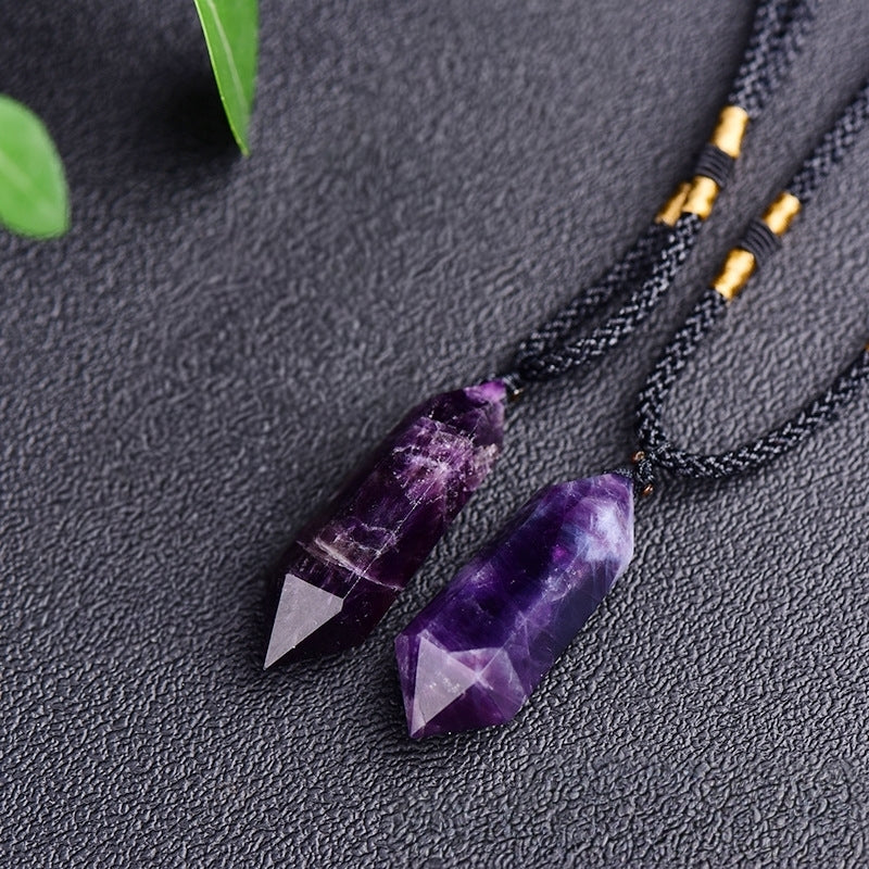 The dreamy purple luster refracted by the amethyst pendant under natural light