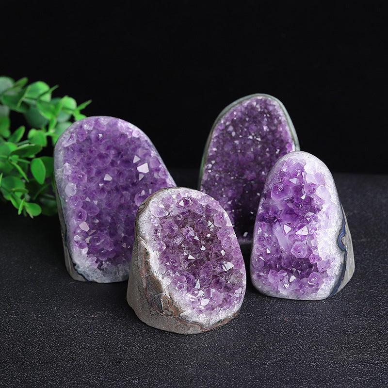 The thick bedrock and naturally formed imprints of the Uruguayan amethyst cluster reveal its history of nurturing over hundreds of millions of years, providing a stable grounding energy.