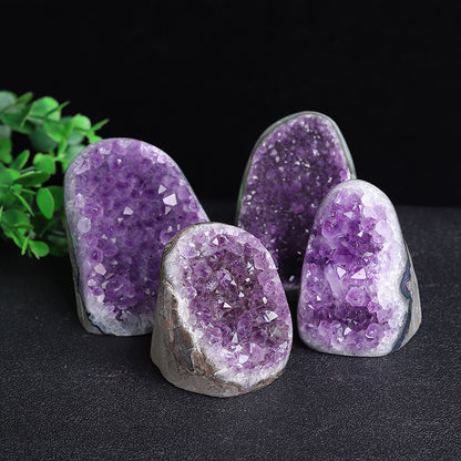 The thick bedrock and naturally formed imprints of the Uruguayan amethyst cluster reveal its history of nurturing over hundreds of millions of years, providing a stable grounding energy.