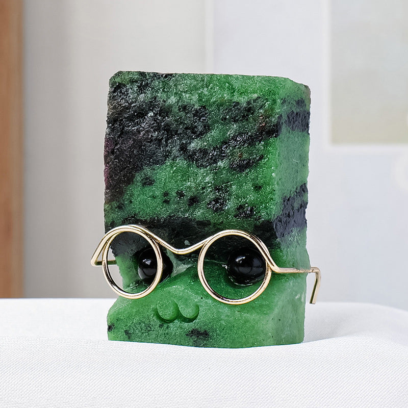 Mr. Chopin's crystal hedgehog is hidden in a glass ecological bottle filled with moss and mini mushrooms, like a forest elf.