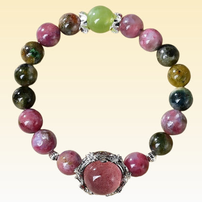 A close-up of the rainbow luster of multi-colored tourmaline beads, showcasing their function of purifying the energy field and providing mental protection