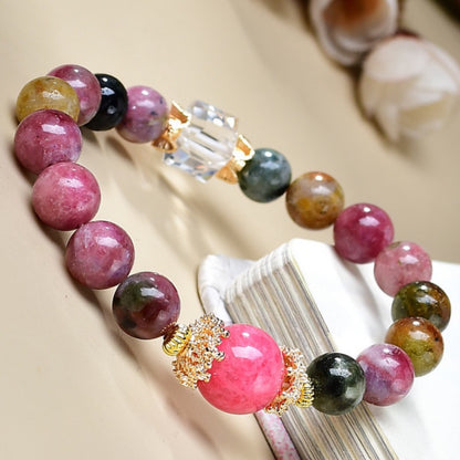 A close-up of the pink and green tourmaline, showcasing its soft color and emotional healing power