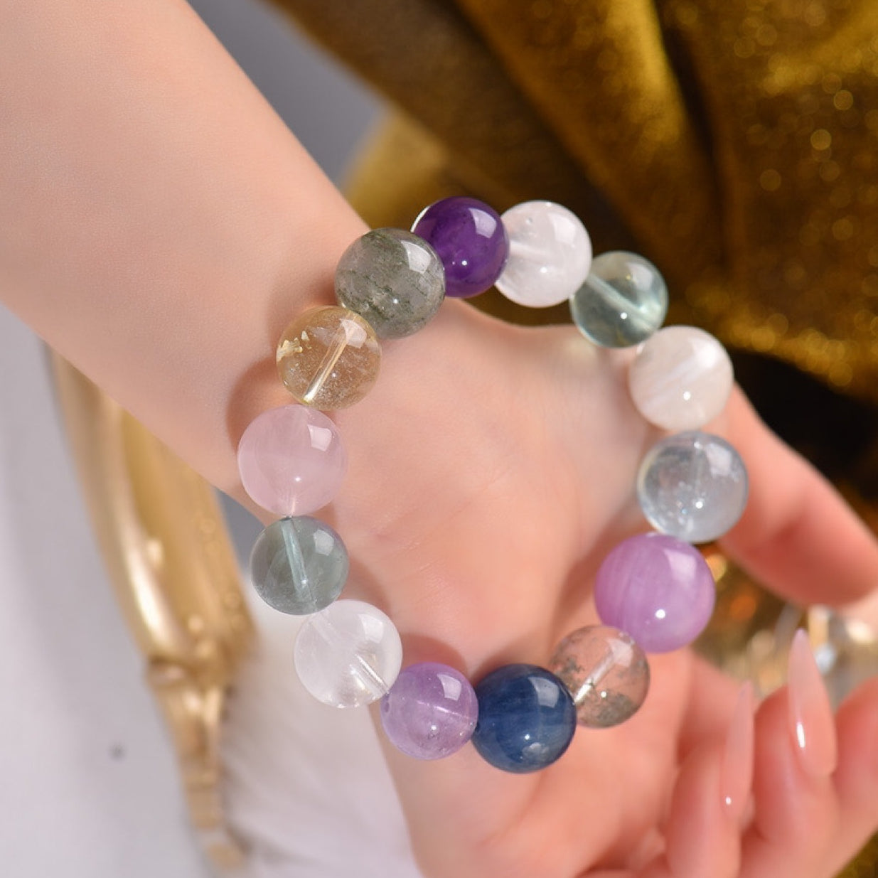 The wealth-attracting bracelet, a powerful combination of green ghost and yellow tower crystal, symbolizes the accumulation of wealth and can be placed at the cash register as a portable feng shui ornament.