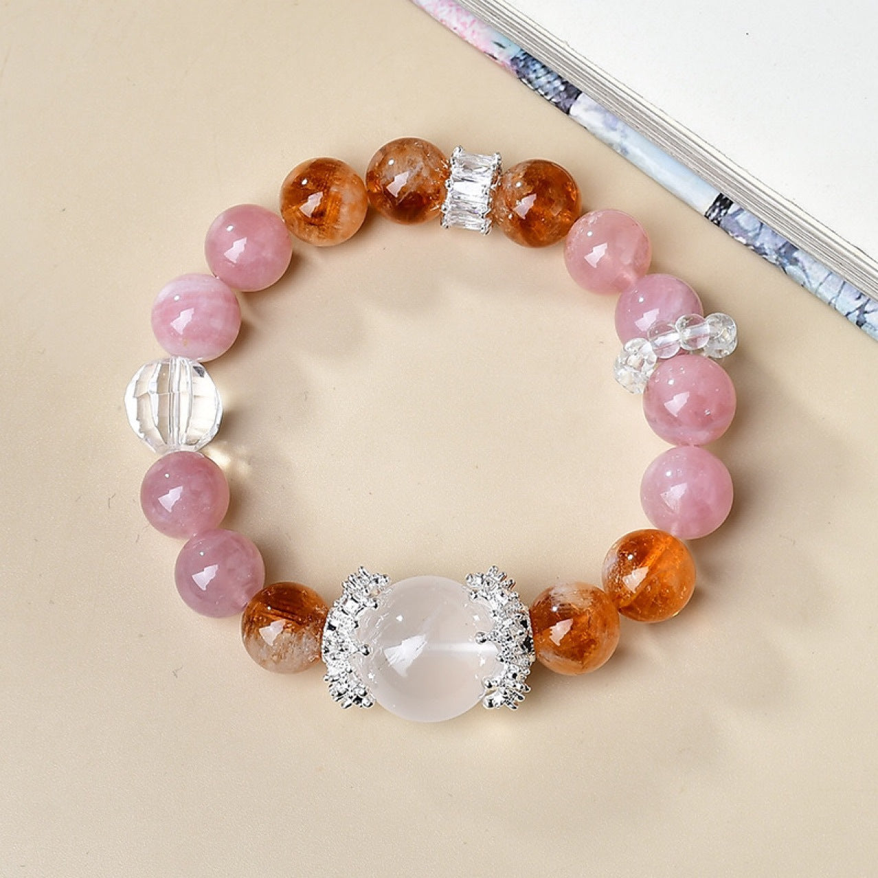 A close-up of the combination of yellow crystal and PI Xiu, symbolizing the attraction and protection of wealth