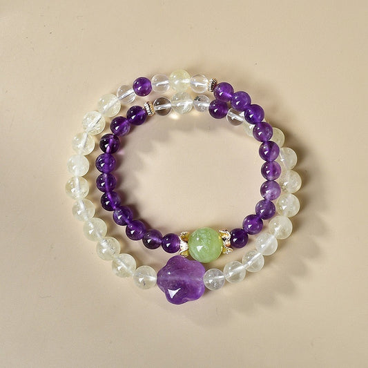 The bracelet is displayed flat, highlighting its dual energy effects of attracting wealth and enhancing wisdom