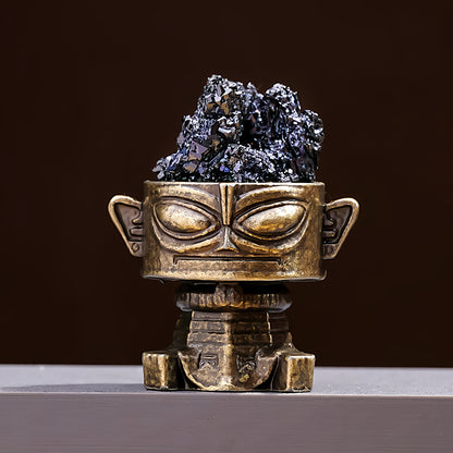 A close-up of the Brazilian citrine cluster shows the crystal inside being transparent and shining with the golden glow of wealth under the light.