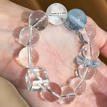 A bracelet placed on a desk or in a study serves as a feng shui ornament. White crystal enhances academic fortune, while aquamarine boosts exam luck.