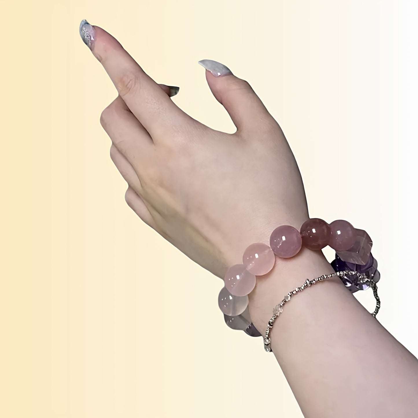 A close-up of the amethyst section shows a deep purple color under the light, symbolizing the elevation of wisdom and spirituality