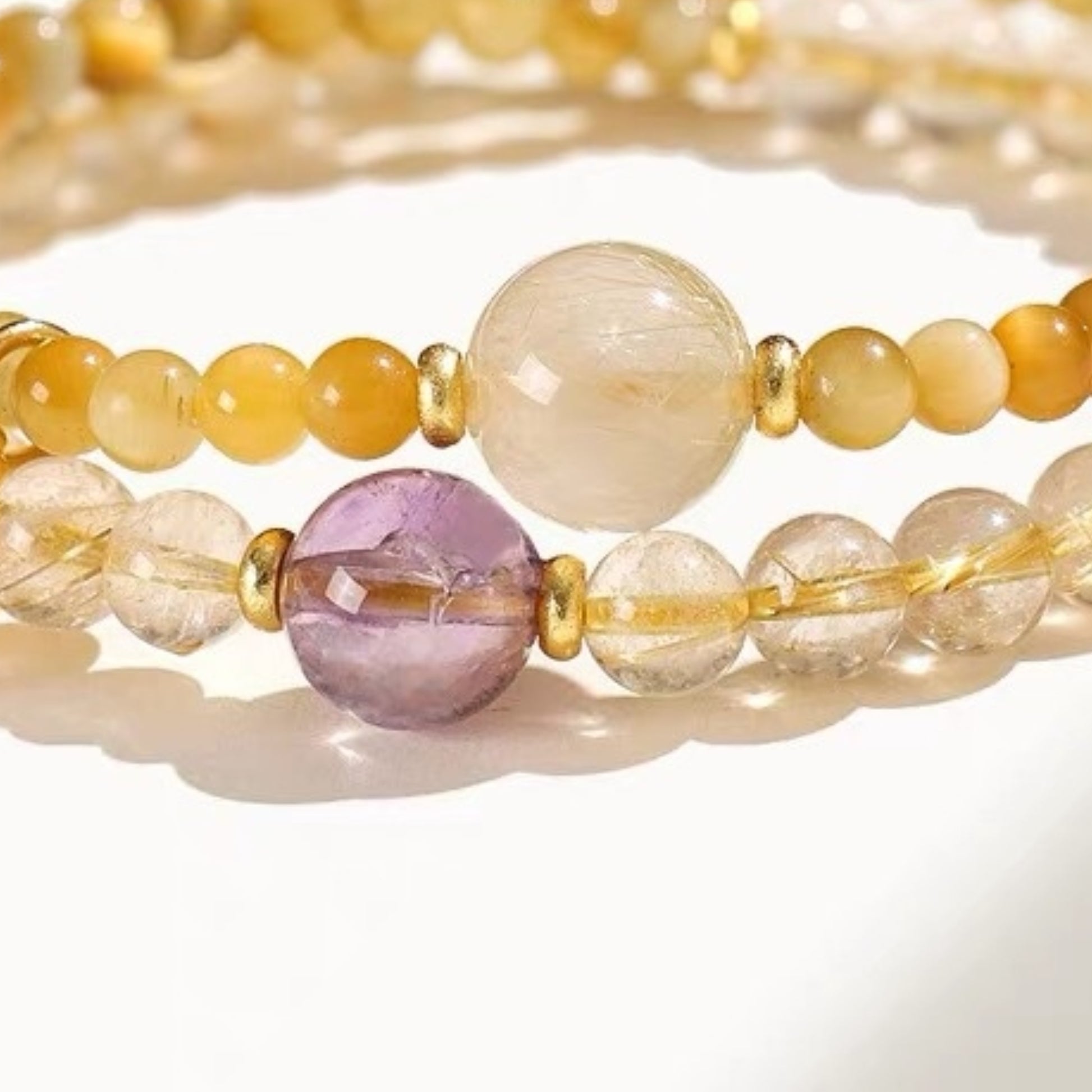 A close-up of the deep purple amethyst, showcasing the spiritual energy that enhances wisdom and intuition