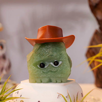 Hedgehog figurines are displayed together with pens and ink bottles, creating a retro writing atmosphere.