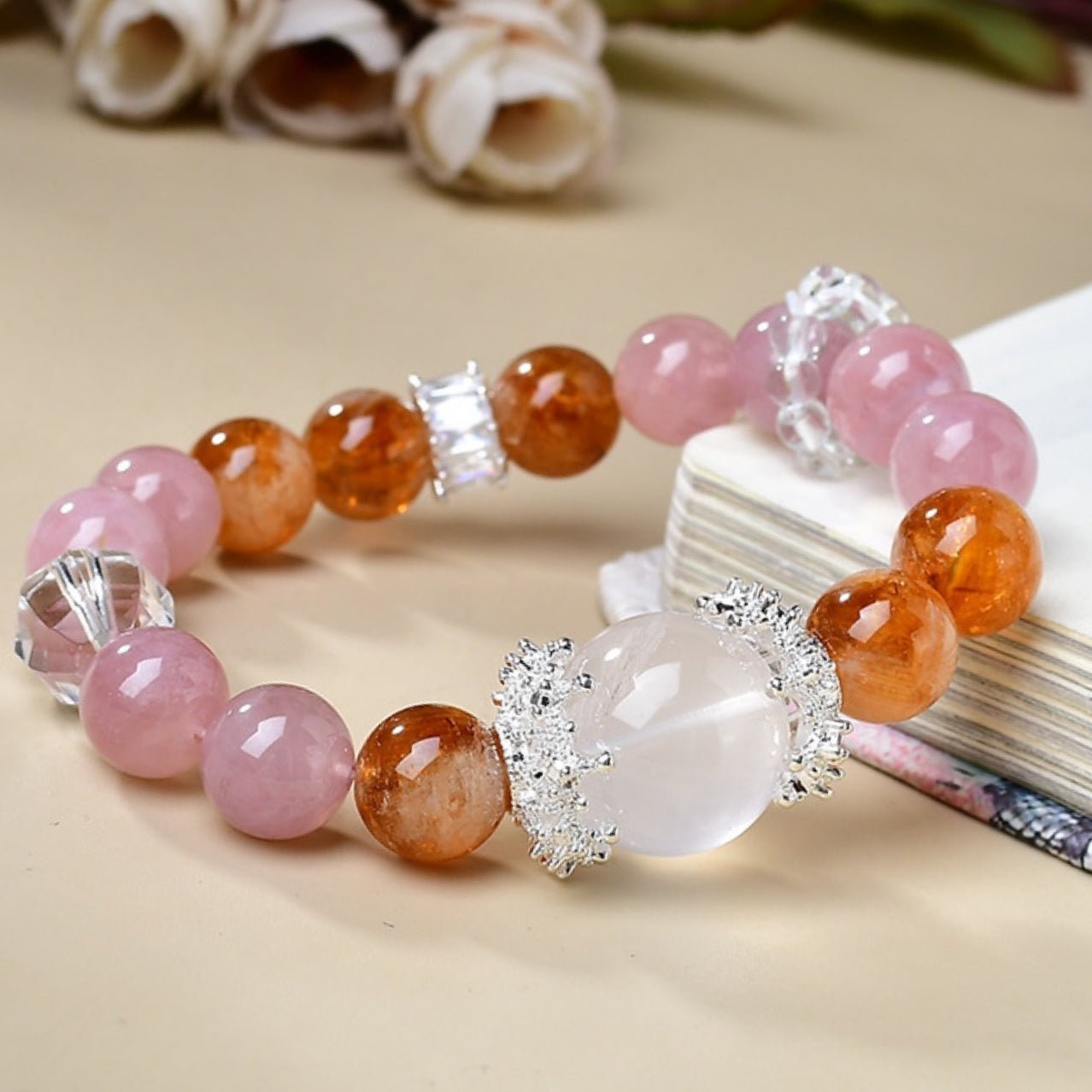 A close-up of yellow crystal and exquisitely carved PI Xiu accessories, highlighting the dual effects of attracting and protecting wealth