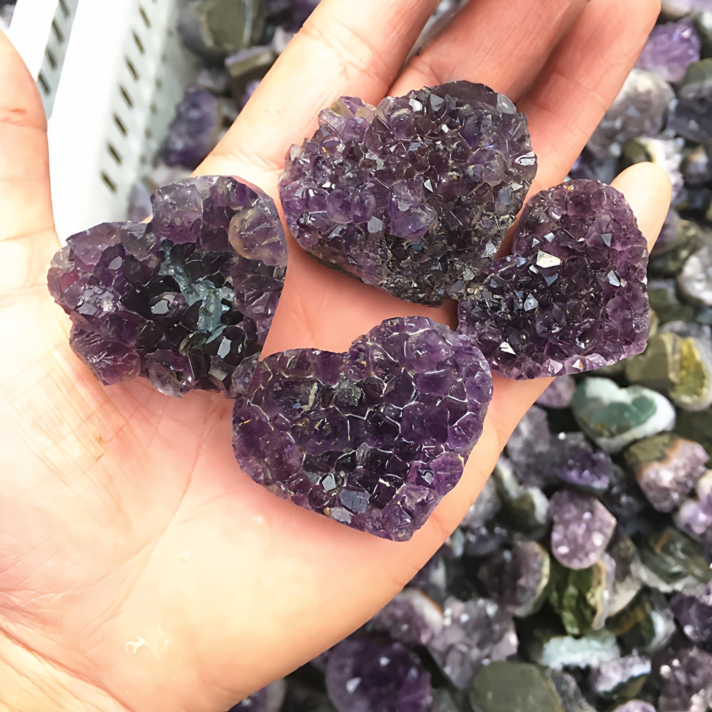 The amethyst cluster on the desk enhances concentration