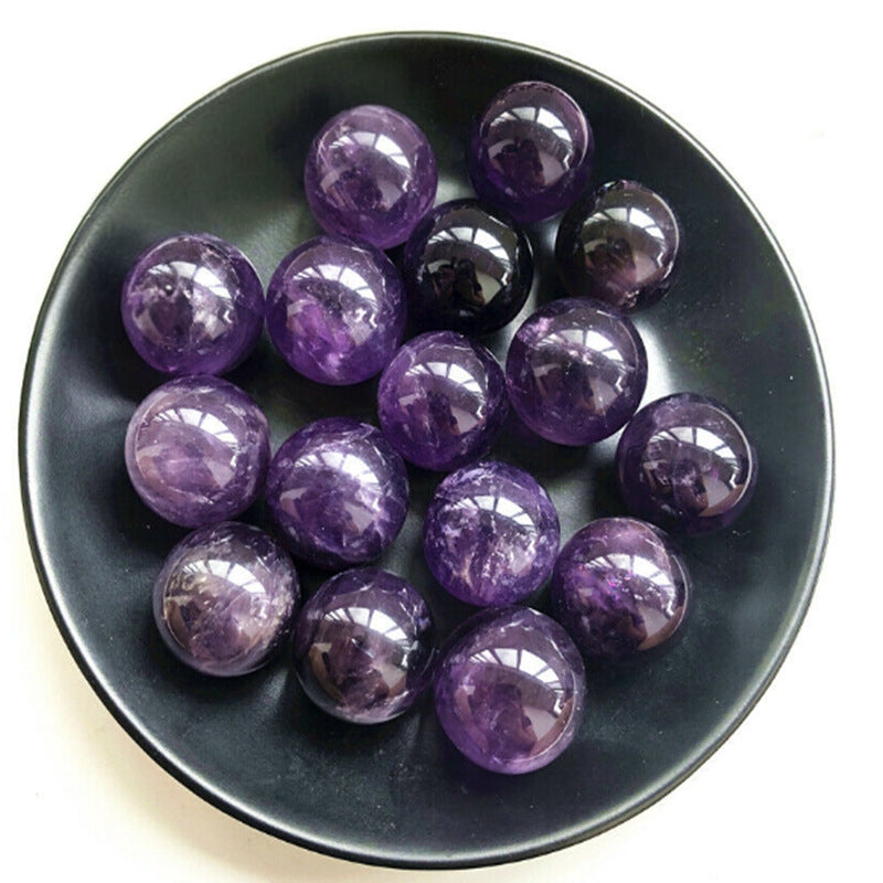 Amethyst sphere decor and calming effect in bedroom