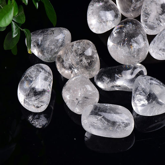 Close-up detail of a single raw Clear Quartz stone showing its natural crystalline structure and frosty surface.