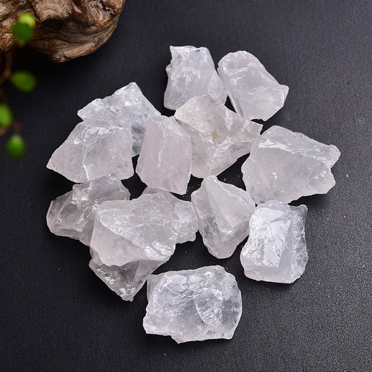 Close-up detail showing the porous, crystalline texture of a raw Clear Quartz stone, ideal for holding essential oils.