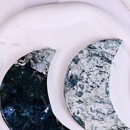 Moon carving used as centerpiece in crystal grid