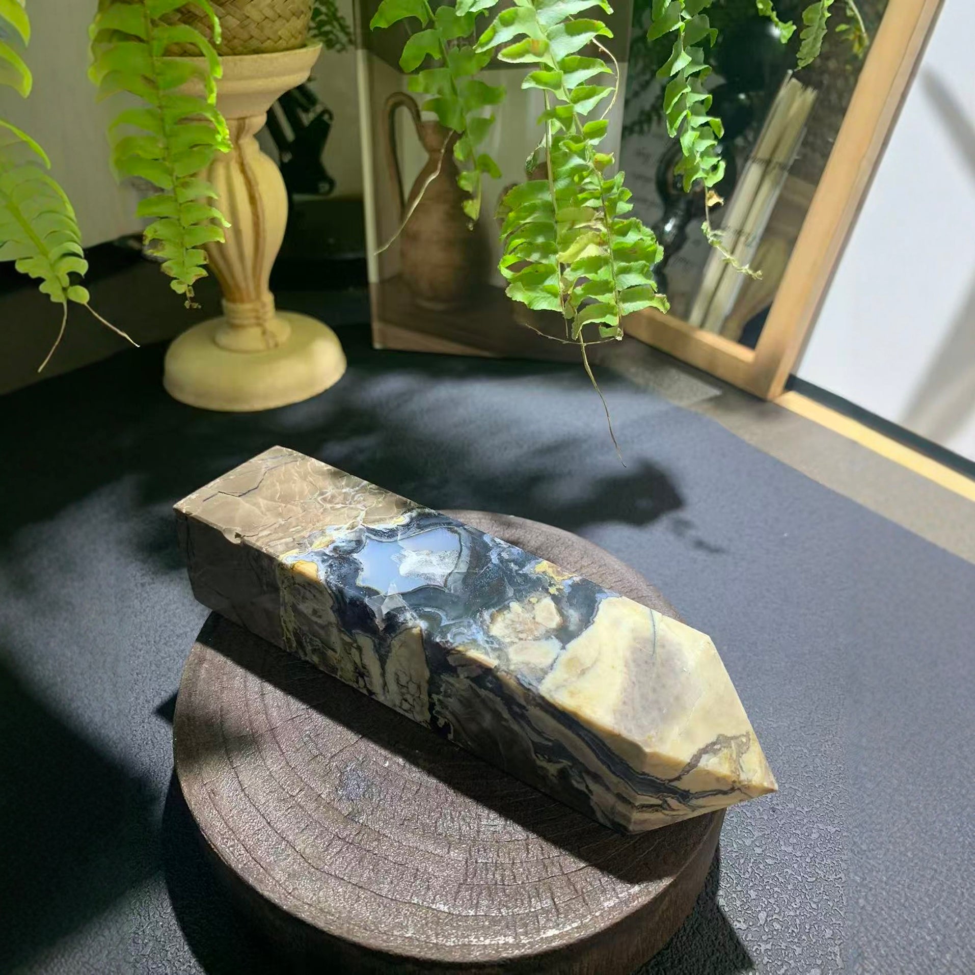 Meditation space anchor with volcanic crystal point