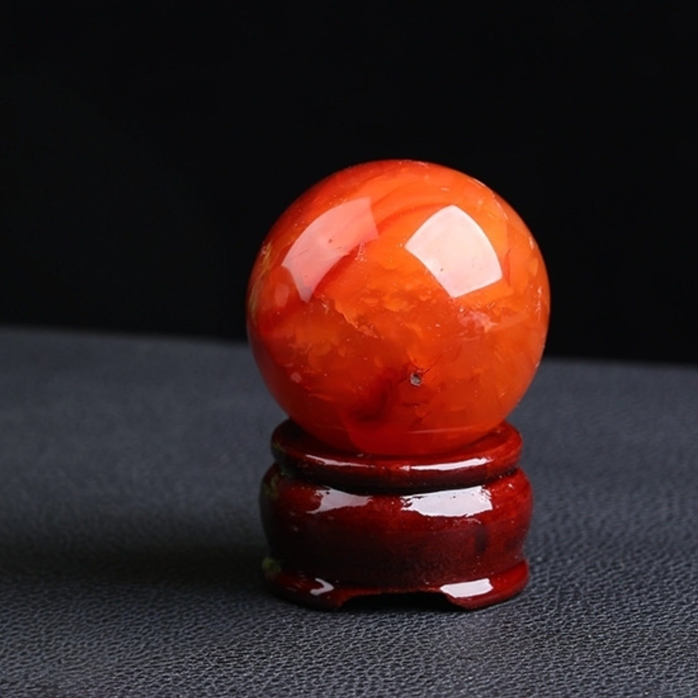 Using red agate ball for energy balance during meditation