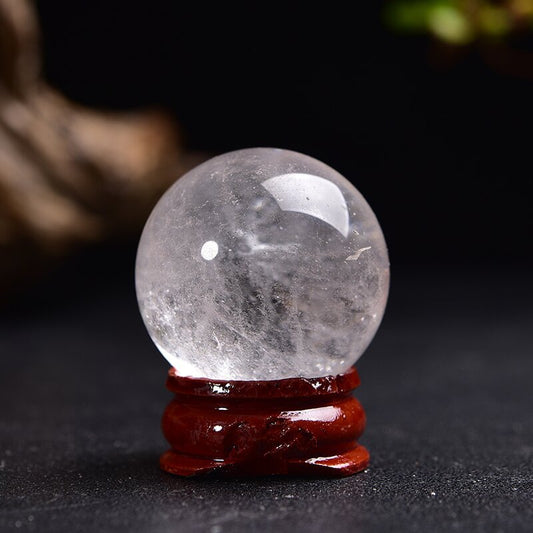 Meditation scene using crystal ball, creating tranquil atmosphere