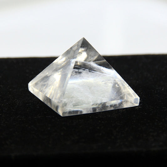 Main product shot of natural clear quartz pyramid showing translucent quality