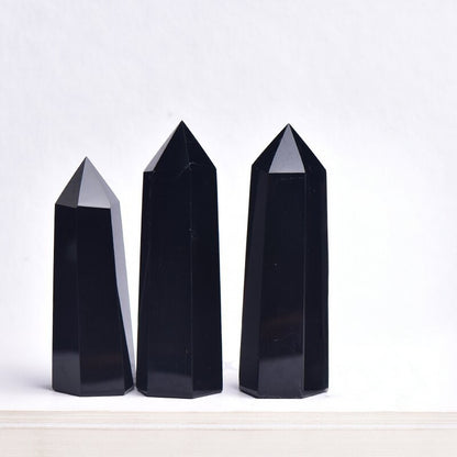 *360-degree view of obsidian hexagonal tower demonstrating precise cutting*