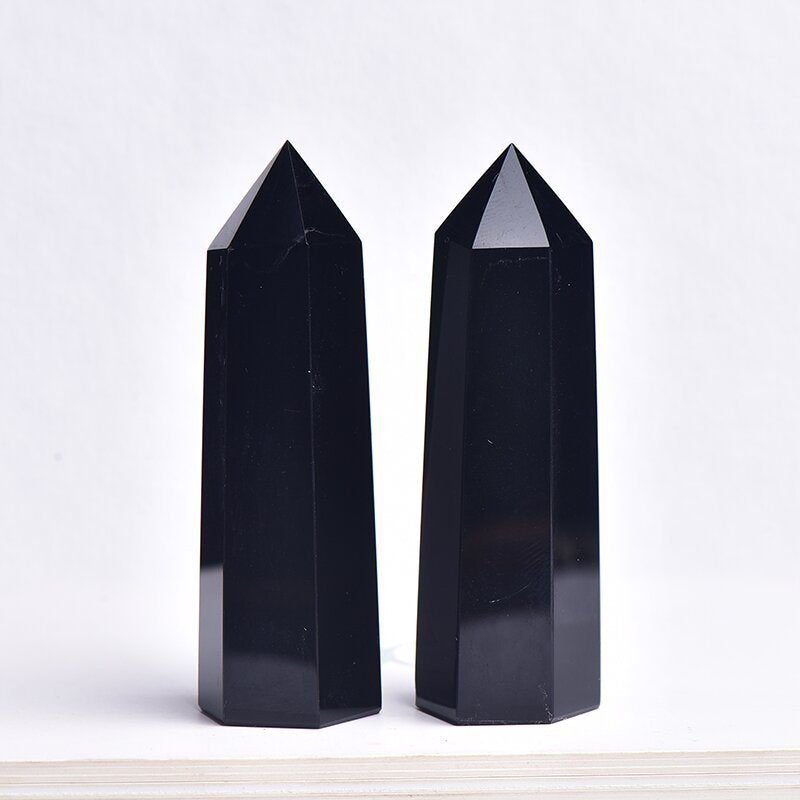 Size comparison of obsidian point showing actual dimensions