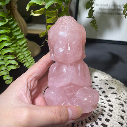 Pink crystal buddha sculpture hand carved details