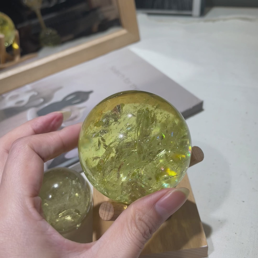 Watch how this raw citrine ice sphere captures and amplifies sunlight while radiating wealth-attracting energy. Perfect for home decor, office success, and spiritual practice. Bring abundance home!