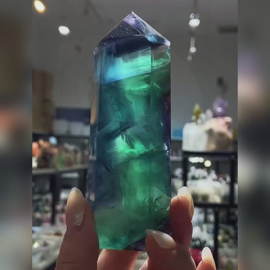 Unlock the calming power of clarity with this Blue Fluorite Tower. Watch as we explore its stunning banded colors, demonstrate how to use it for meditation and chakra balancing, and show its role as both a powerful energy tool and a beautiful decorative piece. Learn to harness its energy for a focused mind.