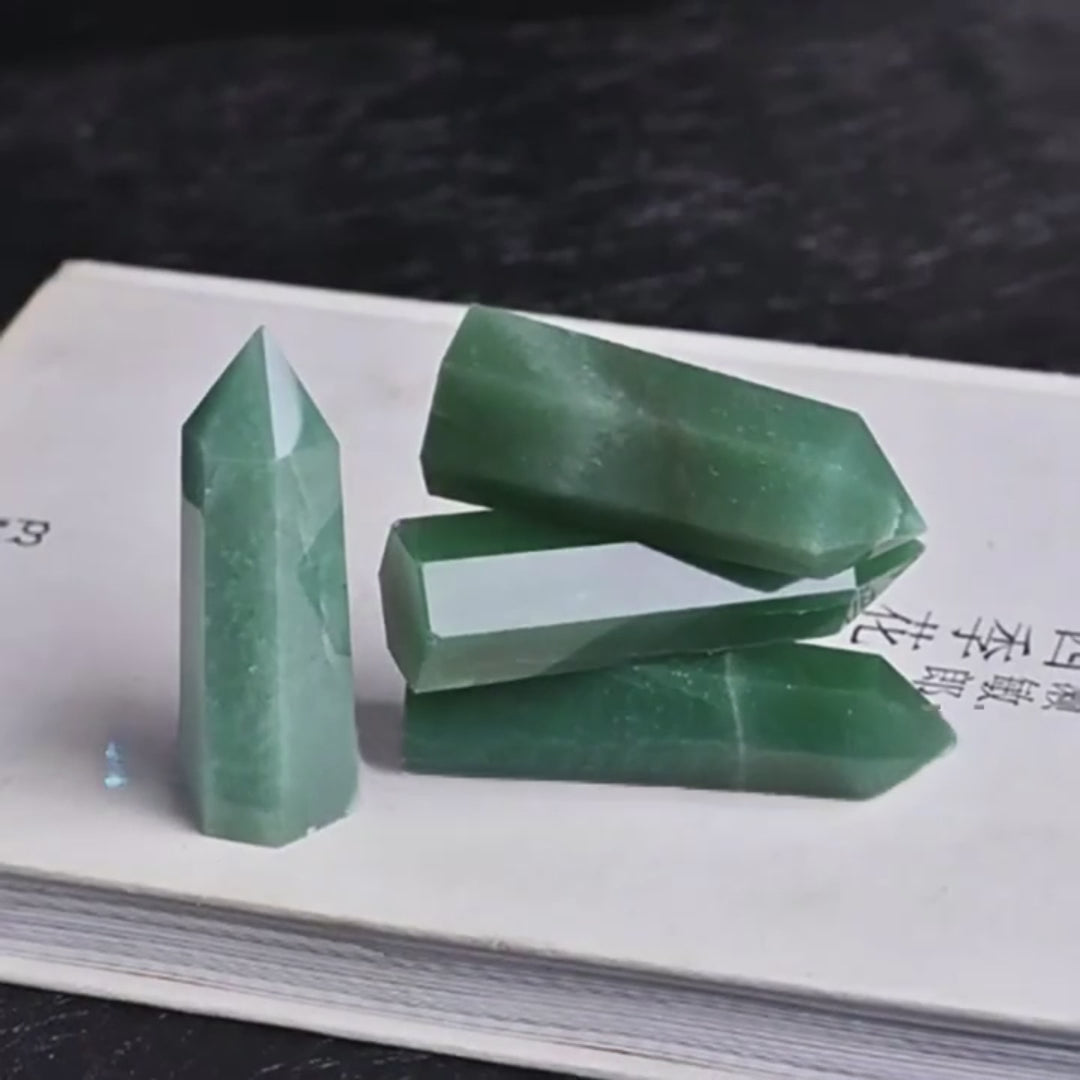 Watch how this aventurine hexagonal point shimmers with prosperity energy while promoting heart healing and good fortune. Perfect for abundance attraction.