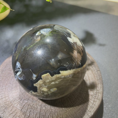 Watch how this volcanic agate sphere radiates powerful grounding energy while showcasing Earth's ancient geological history. Perfect for protection, meditation, and energy balancing. Connect with Earth's core!