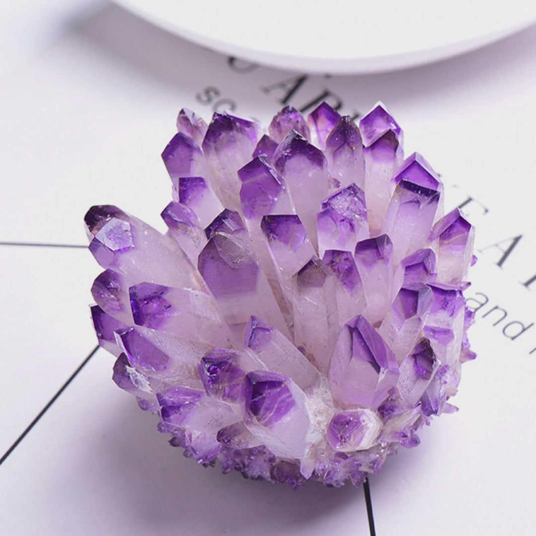 Watch how this amethyst cluster radiates purple healing energy while enhancing intuition and clearing negative vibrations. Perfect for office and meditation spaces.