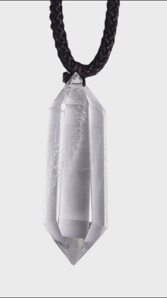 Discover the power of your Natural Clear Quartz Double Terminated Pendant. This video shows its beautiful hexagonal cut, how to wear it daily, and guides you through using it for meditation, intention setting, and personal energy cleansing. See how this versatile crystal can transform your spiritual practice.