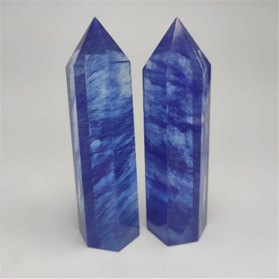 Watch how this blue goldstone hexagonal point sparkles with motivational energy for career success and confidence building. Perfect for modern workspaces.