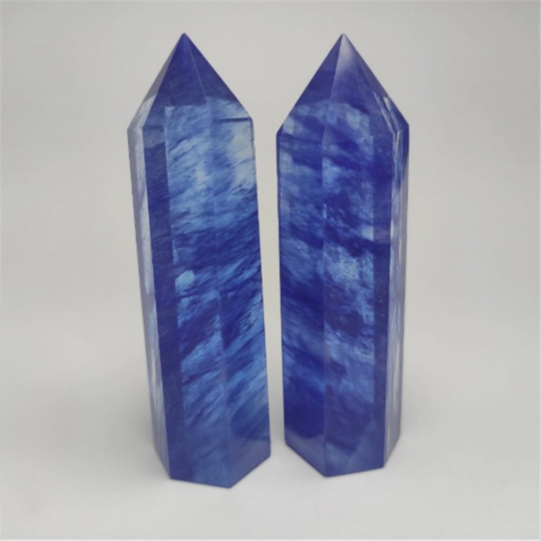 Watch how this blue goldstone hexagonal point sparkles with motivational energy for career success and confidence building. Perfect for modern workspaces.