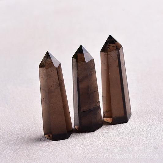 Using smoky quartz point for grounding energy during meditation
