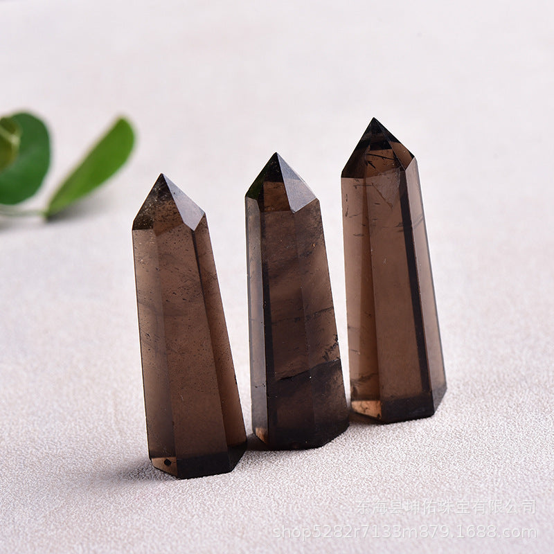 Using smoky quartz point for root chakra balancing healing