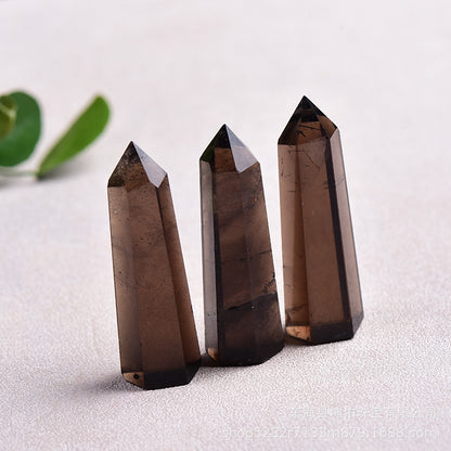 Using smoky quartz point for root chakra balancing healing