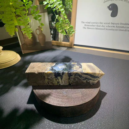 Root chakra grounding with volcanic agate crystal