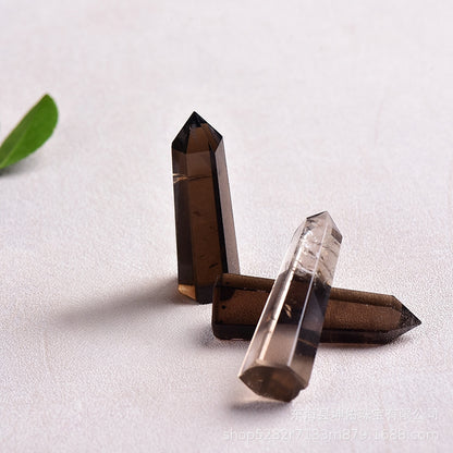 Smoky quartz point placement on desk for stabilizing energy
