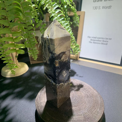 Natural volcanic agate single terminated point with banding patterns