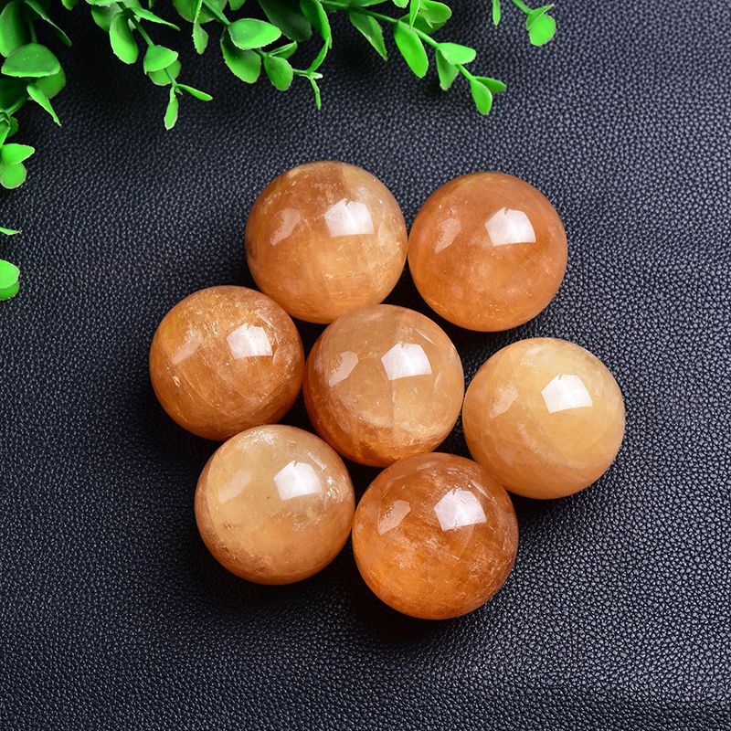 Natural yellow calcite crystal sphere for wealth and energy cleansing